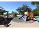 Community playground with various play structures at 11059 E Yucca St, Scottsdale, AZ 85259