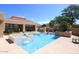 Community pool with spa and surrounding landscaping at 11059 E Yucca St, Scottsdale, AZ 85259