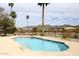 Community swimming pool with surrounding desert landscape at 11059 E Yucca St, Scottsdale, AZ 85259