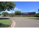 School building with welcome banner and trees at 11059 E Yucca St, Scottsdale, AZ 85259