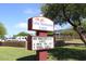 Sign for Lexis Preparatory School with enrollment info at 11059 E Yucca St, Scottsdale, AZ 85259