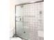 Updated shower with patterned tile and glass enclosure at 11059 E Yucca St, Scottsdale, AZ 85259