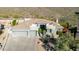 Luxury home with three-car garage and desert landscaping at 11138 E Verbena Ln, Scottsdale, AZ 85255