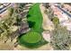 Aerial view of a putting green surrounded by trees at 1315 Leisure World --, Mesa, AZ 85206