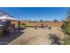 Relaxing backyard oasis with covered patio, hot tub, and artificial turf at 13930 W Tierra Grande --, Surprise, AZ 85387