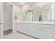 Elegant bathroom with double vanity and white cabinets at 13930 W Tierra Grande --, Surprise, AZ 85387