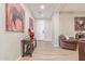 Bright and spacious entryway with wood-look tile flooring, and art at 13930 W Tierra Grande --, Surprise, AZ 85387