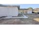 Backyard view showing a patio, storage shed, and a partially landscaped yard at 1436 E Downing St, Mesa, AZ 85203