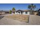 Updated home with a clean, modern exterior and landscaping at 1436 E Downing St, Mesa, AZ 85203
