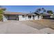 Nice curb appeal with a gravel driveway and small lawn at 1436 E Downing St, Mesa, AZ 85203