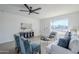 Living room with a comfortable seating area and large window at 1436 E Downing St, Mesa, AZ 85203
