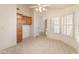 Bright dining area with tiled floor and plantation shutters at 14543 W Bison Path, Surprise, AZ 85374