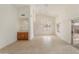 Bright dining room with tile floors and built-in cabinetry at 14543 W Bison Path, Surprise, AZ 85374