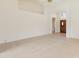 Bright dining room with tile floors and built-in cabinetry at 14543 W Bison Path, Surprise, AZ 85374