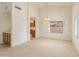 Bright and airy living room with tile floors at 14543 W Bison Path, Surprise, AZ 85374
