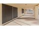 Covered patio with screens, providing shade and privacy at 14543 W Bison Path, Surprise, AZ 85374