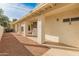 Covered patio with access to backyard, offering shade and space at 14543 W Bison Path, Surprise, AZ 85374
