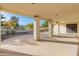 Spacious covered patio overlooking a landscaped backyard at 14543 W Bison Path, Surprise, AZ 85374