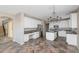 Beautiful kitchen featuring white cabinetry, stainless steel appliances, and an island at 14586 W Sierra St, Surprise, AZ 85379