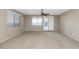 Bright living room with access to backyard patio at 14586 W Sierra St, Surprise, AZ 85379