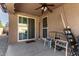 Patio with two chairs and sliding glass door access at 16468 W Mariposa Grande --, Surprise, AZ 85387