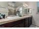 Bathroom with double sinks, a large mirror, and shower at 16468 W Mariposa Grande --, Surprise, AZ 85387