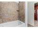 Clean bathroom with bathtub and tile surround at 16468 W Mariposa Grande --, Surprise, AZ 85387