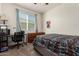 Bedroom with bed, desk and dresser at 16468 W Mariposa Grande --, Surprise, AZ 85387