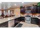 Modern kitchen with stainless steel appliances and granite countertops at 16468 W Mariposa Grande --, Surprise, AZ 85387