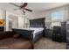Spacious main bedroom with king-size bed and an attached bathroom at 16468 W Mariposa Grande --, Surprise, AZ 85387