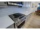Modern kitchen with stainless steel appliances and stylish backsplash at 17221 W Middlebury St, Surprise, AZ 85388