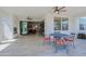 Outdoor patio with seating area and fireplace, accessible through sliding glass doors at 17221 W Middlebury St, Surprise, AZ 85388
