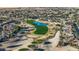 Aerial view of golf course and surrounding neighborhood at 20064 N Rawhide Way, Surprise, AZ 85387