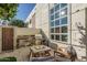 Outdoor patio with fire pit, seating, and built in grill at 21 W Pasadena Ave # 6, Phoenix, AZ 85013