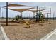 playground with shade structures and play equipment at 22856 E Roundup Way, Queen Creek, AZ 85142