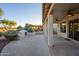 Covered patio with ceiling fans and built-in fire pit at 2737 N 160Th Ave, Goodyear, AZ 85395