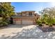 Two-story house with a three-car garage and well-maintained landscaping at 2813 E Indian Wells Pl, Chandler, AZ 85249