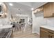 Modern kitchen with light wood cabinets, quartz countertops, and stainless steel appliances at 6129 W Pierce St, Phoenix, AZ 85043