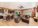 Open concept living room and kitchen with tile floors at 7979 E Princess Dr # 13, Scottsdale, AZ 85255