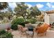 Inviting patio with fire pit and comfortable seating at 7979 E Princess Dr # 13, Scottsdale, AZ 85255