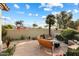 Landscaped patio area with seating and fire pit feature at 7979 E Princess Dr # 13, Scottsdale, AZ 85255