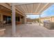 Covered patio with built-in grill, outdoor seating, and tile flooring at 8102 W Autumn Vista Way, Florence, AZ 85132