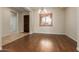 Bright dining room with hardwood floors and neutral walls at 8102 W Autumn Vista Way, Florence, AZ 85132