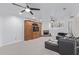 Gathering room featuring built-in entertainment center and fireplace at 8360 S Homestead Ln, Tempe, AZ 85284