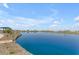 Serene lakefront view with a walking path at 944 W Saddle Run, Apache Junction, AZ 85120