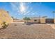 Spacious backyard with gravel and mature trees at 1121 N Revere --, Mesa, AZ 85201