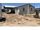 Single story home with covered porch and chain link fence at 12601 S Hermit Rd, Buckeye, AZ 85326