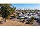 Wide aerial view of the home and surrounding neighborhood at 12640 N Pebble Beach Dr, Sun City, AZ 85351