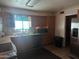 Kitchen with wood cabinets, ample counter space and appliances at 12807 N 21St Dr, Phoenix, AZ 85029