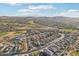 Aerial view showcasing a single-Gathering home in a community with golf course at 18215 W Desert Sage Dr, Goodyear, AZ 85338